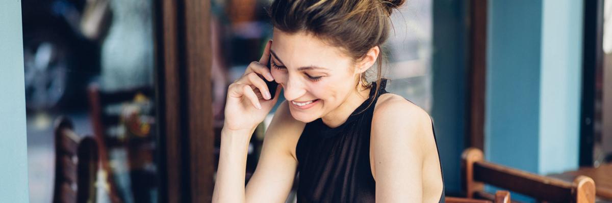 woman on the phone in a cafe